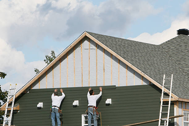 Professional Siding technician working in Yorkville, NY